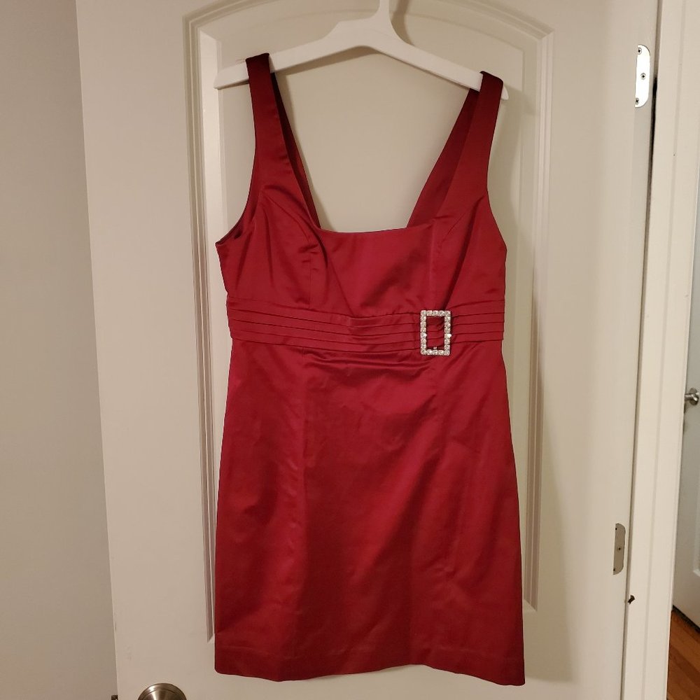 Bebe Red Cocktail Dress with rhinestone accent . sz Medium.